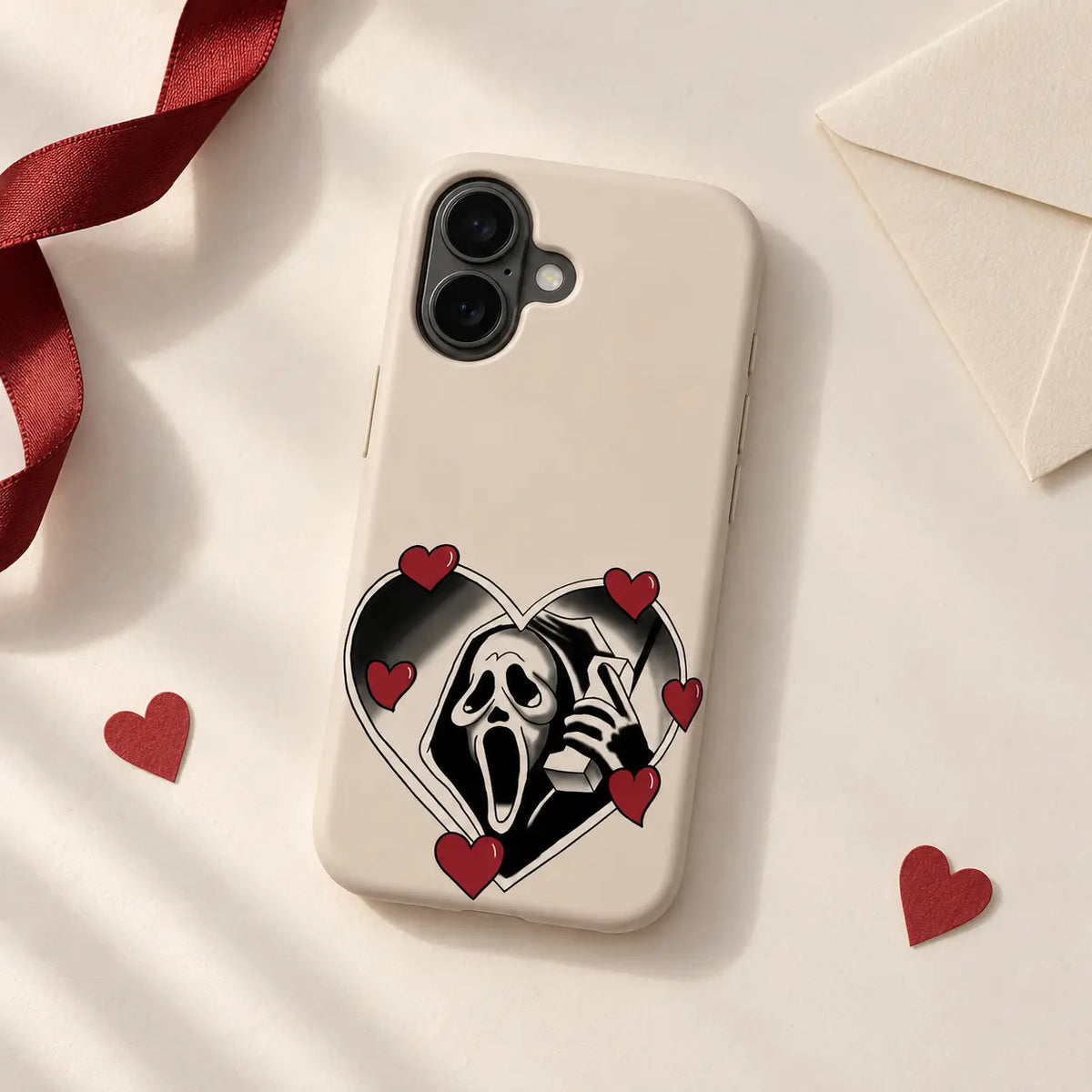 Sweet Scream phone case styled on a warm neutral tabletop