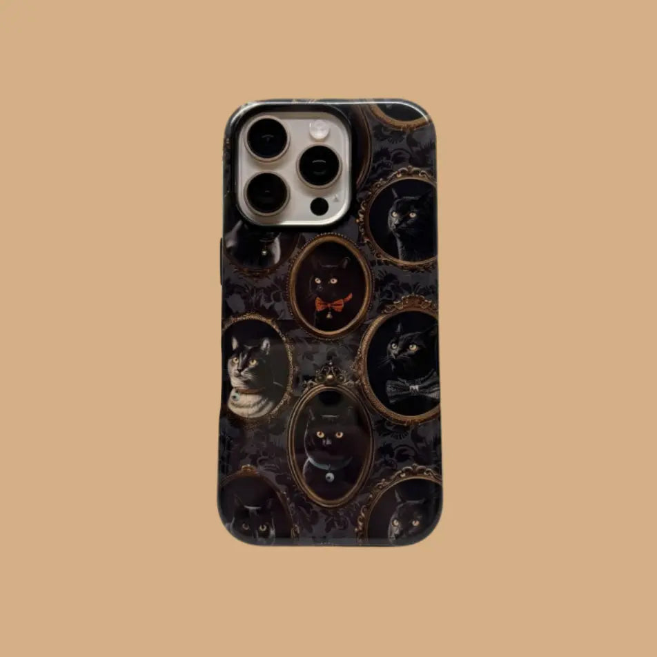This Halloween phone case features a vintage-inspired design with black cats in ornate frames, blending Gothic aesthetics with a touch of spooky mystery.