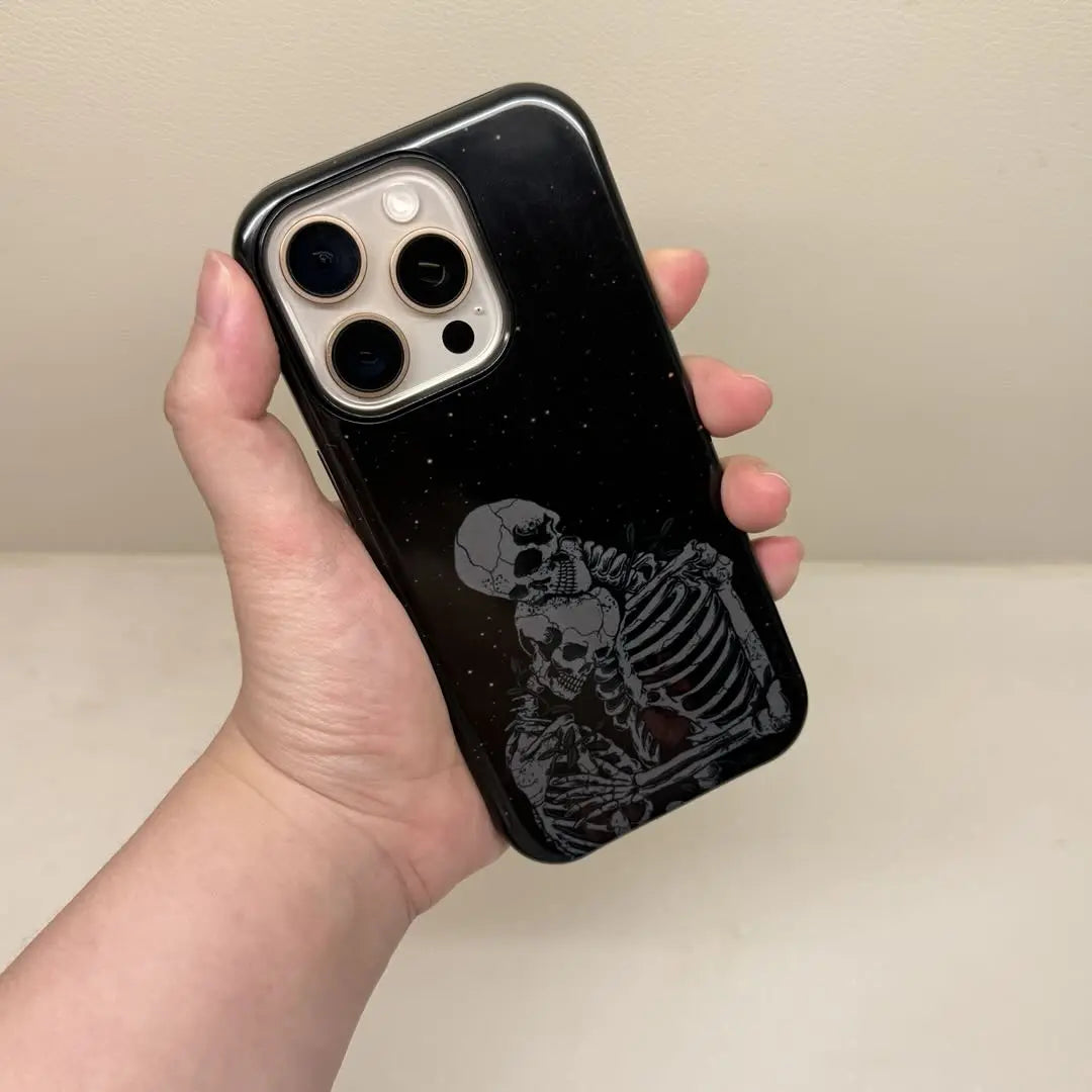 The Halloween phone case features the iconic Ghostface from Scream as its main theme, incorporating flame and text element for a trendy and eye-catching design.