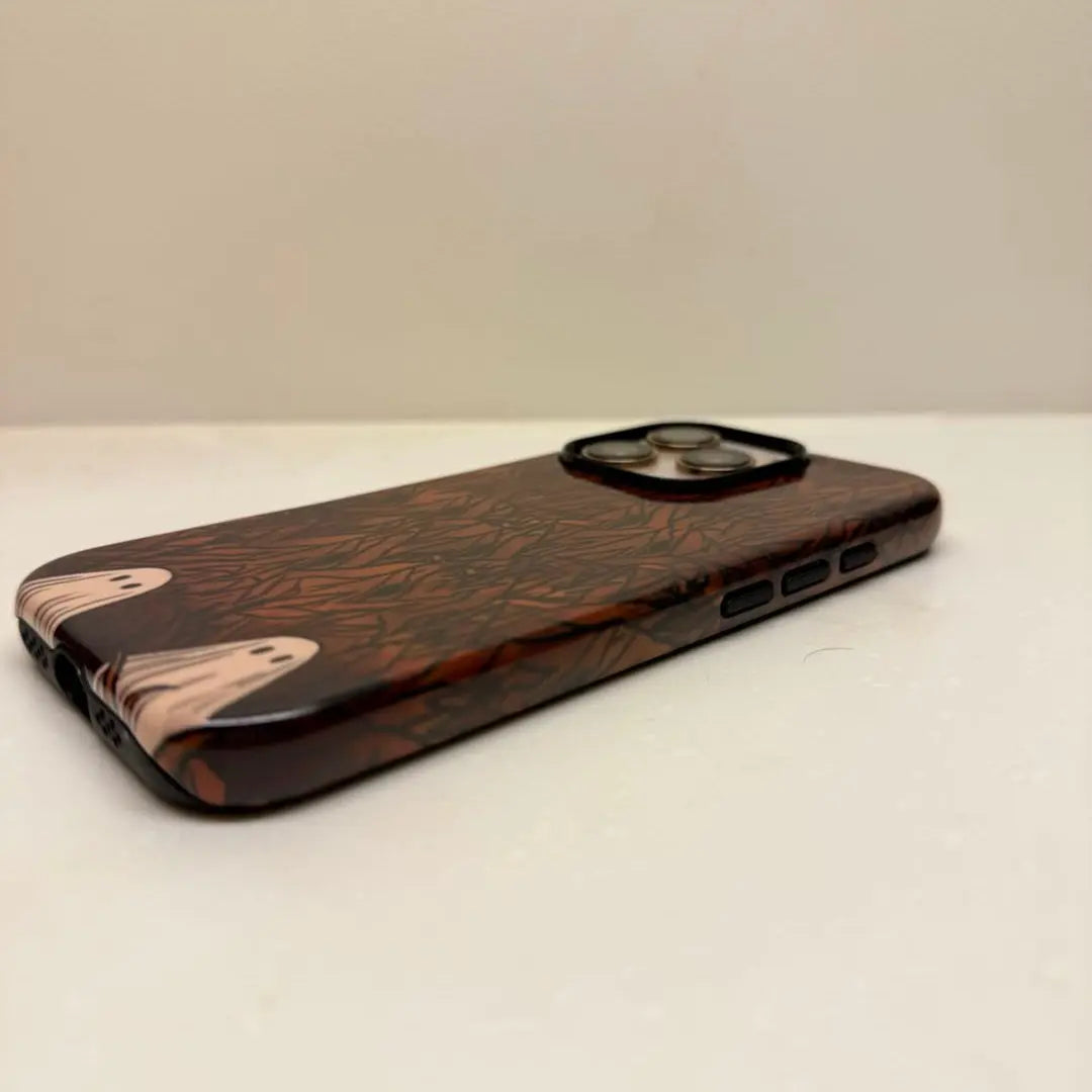 This Halloween phone case features a beautiful oil painting style of a skeleton lying in flowers, blending life and death for a unique artistic touch.