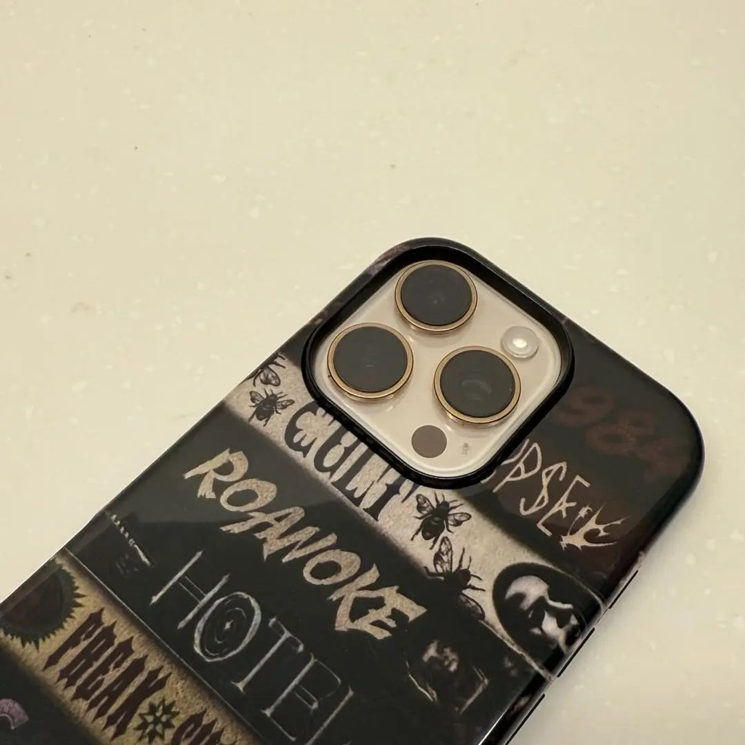 This Halloween phone case features a VHS tape-style design with classic American horror movie titles, making it a unique and must-have item for horror fans.