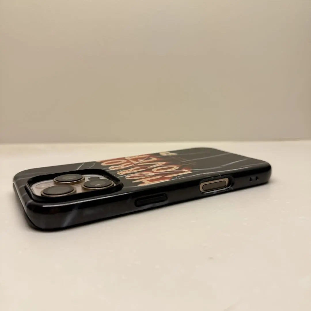 This Halloween phone case features a beautiful oil painting style of a skeleton lying in flowers, blending life and death for a unique artistic touch.