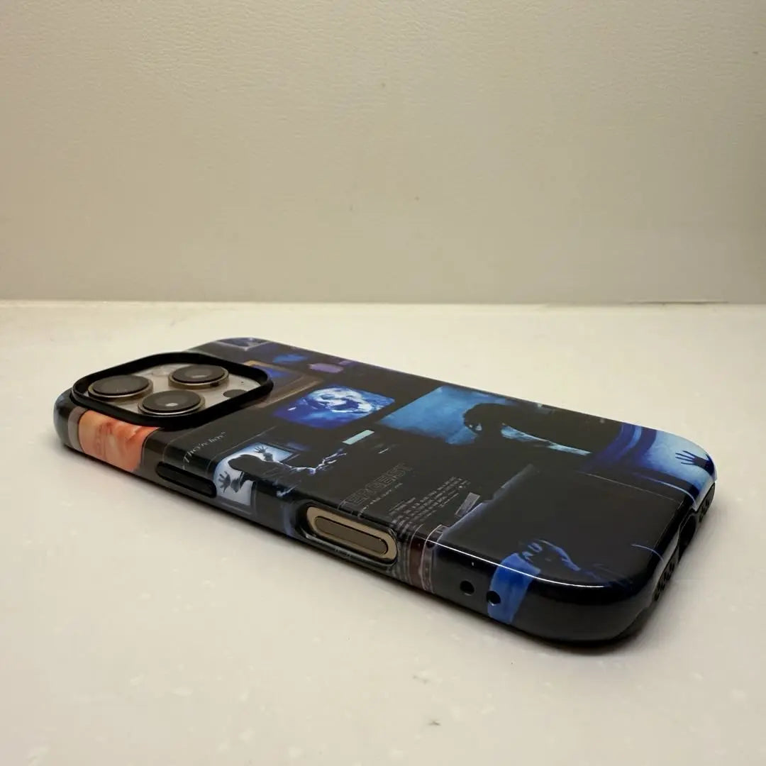 This Halloween phone case features a collage of classic horror movie elements, bringing a trendy vibe that makes it a must-have fashion item for the season.