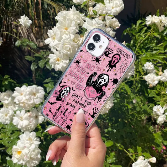 This sparkling pink Ghostface phone case is a cute yet spooky accessory. Featuring classic movie quotes, it adds a unique touch to your Halloween look.