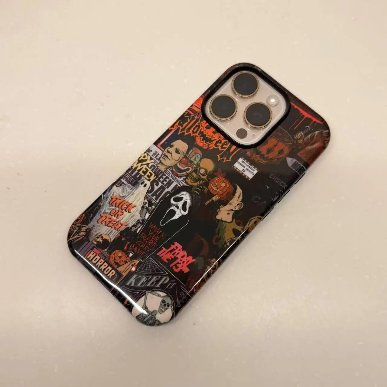 Featuring a collage of classic horror movie characters, this Halloween-themed phone case is a must-have accessory to make your phone stand out.