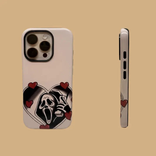 This Halloween phone case features a vintage collage of classic elements like pumpkins, black cats, and skeletons, adding a unique festive vibe.