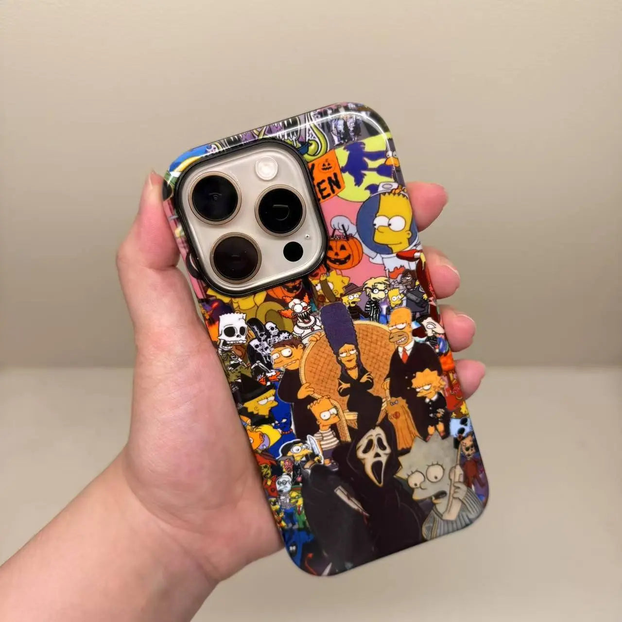 This unique Halloween phone case creatively combines The Simpsons and Ghostface, presenting a quirky vibe that makes your phone truly stand out.