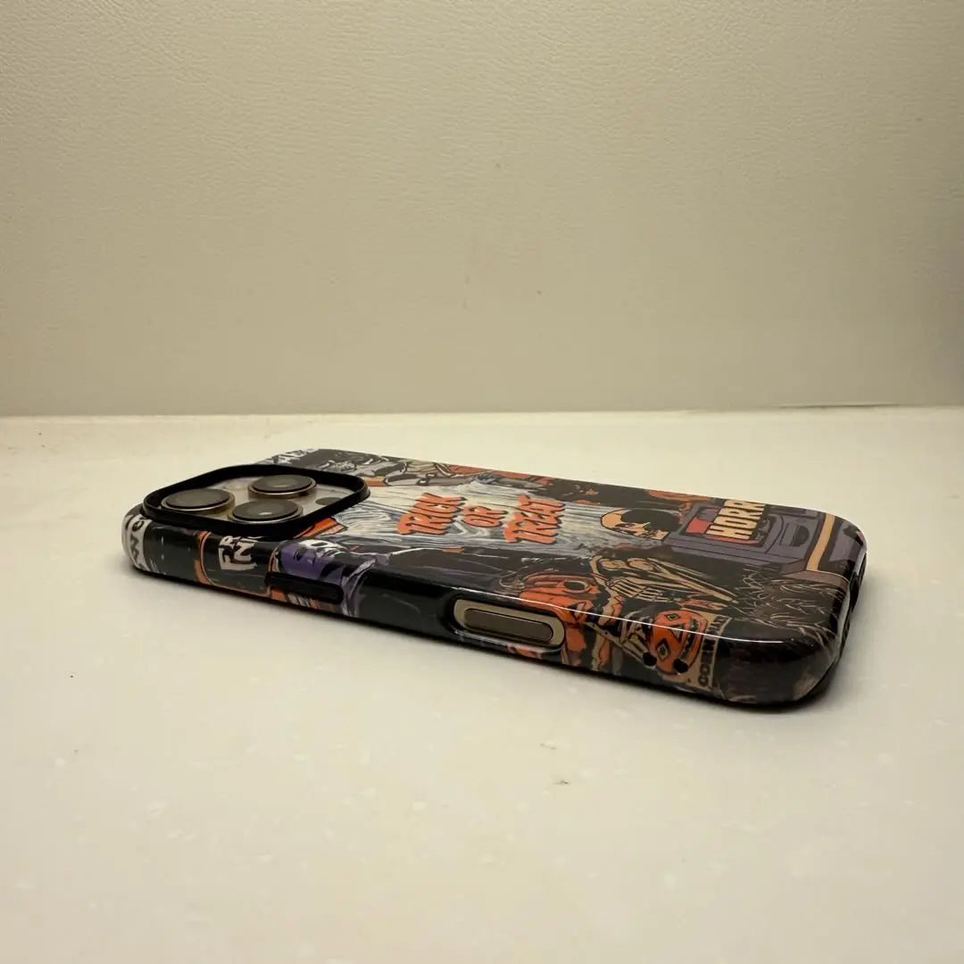This Halloween phone case features a vintage horror movie poster collage, bringing a unique and trendy vibe that makes you stand out this Halloween.