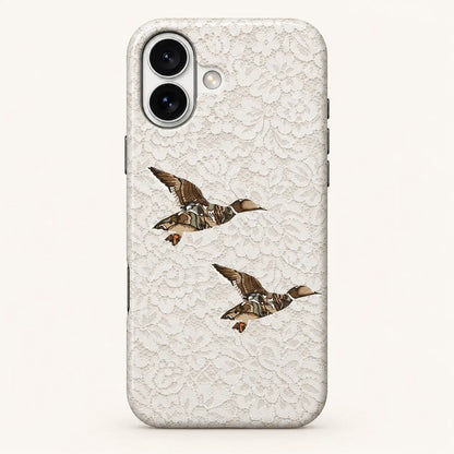 iPhone case: white floral lace print; two camouflage ducks.