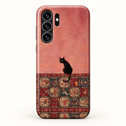 Samsung rear view; Black cat above a red, cream and deep teal floral bird rug print