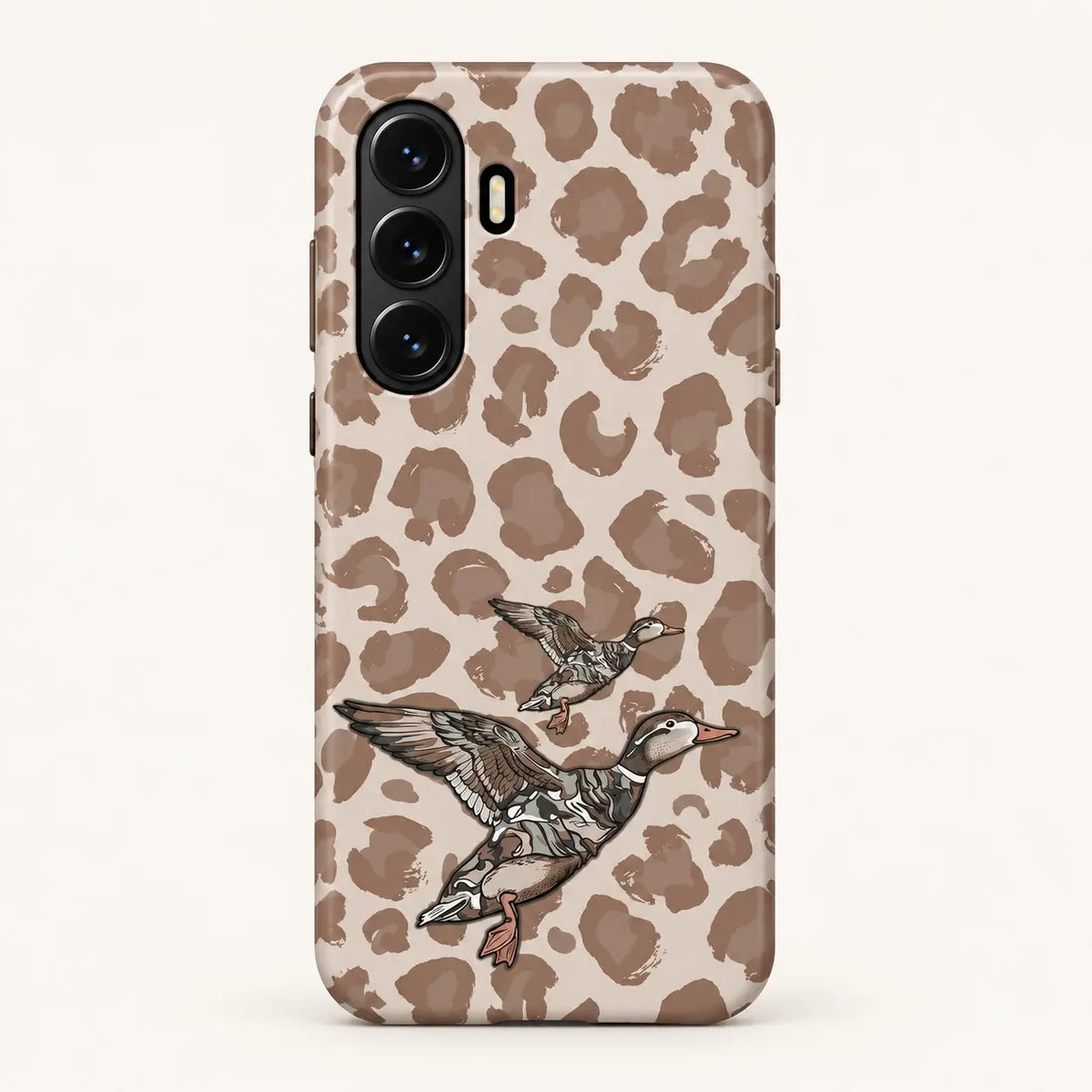 Samsung Galaxy case: beige and taupe leopard spots; two flying ducks, one large and one small.
