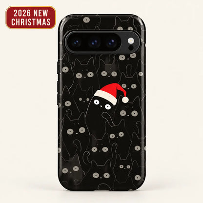 Google Pixel case featuring black cats with round gray eyes and a bright red Christmas hat.