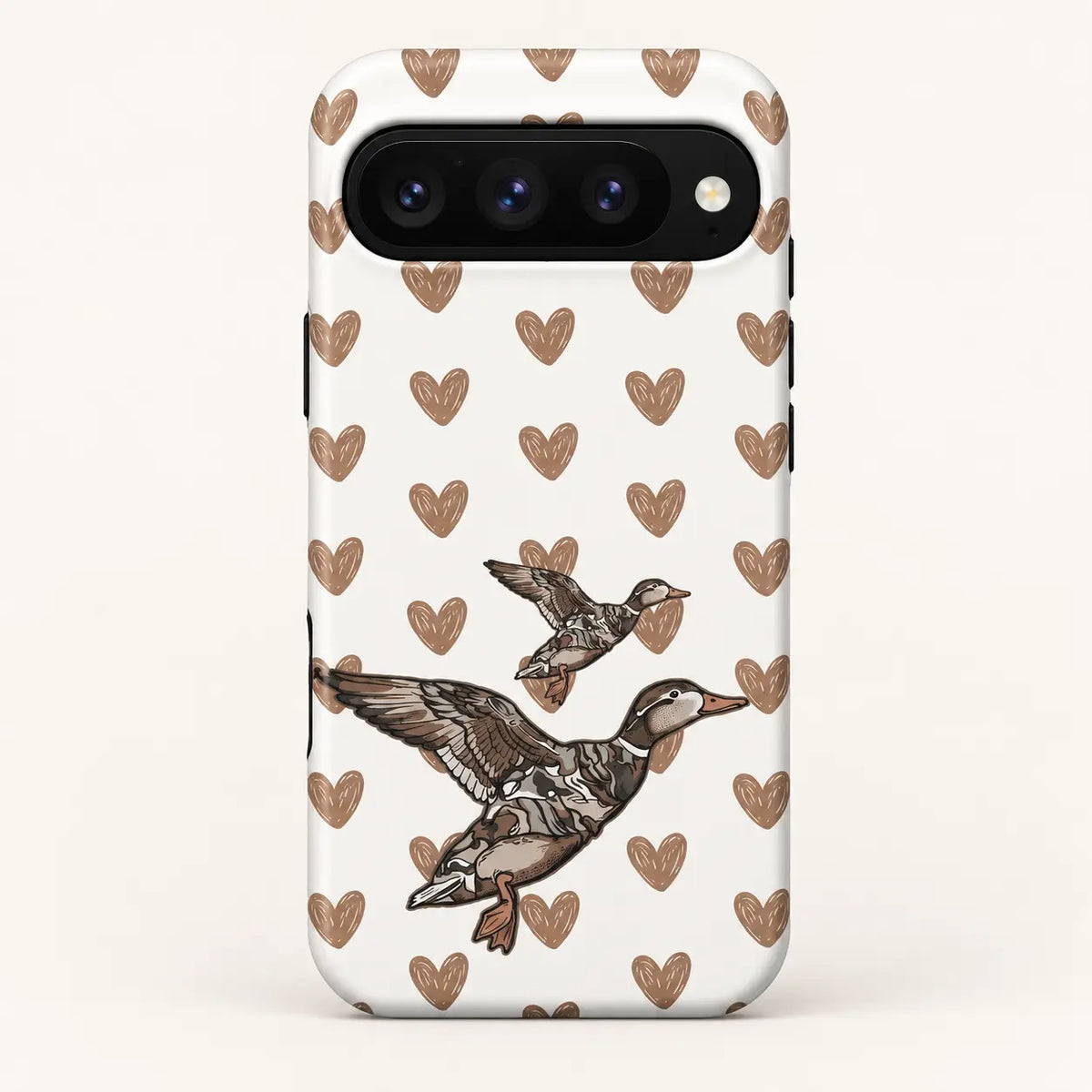 Google Pixel case: white background with sketch-style tan hearts; two flying ducks, one large and one small.
