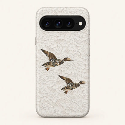 Google Pixel case: white floral lace print; two camouflage ducks.