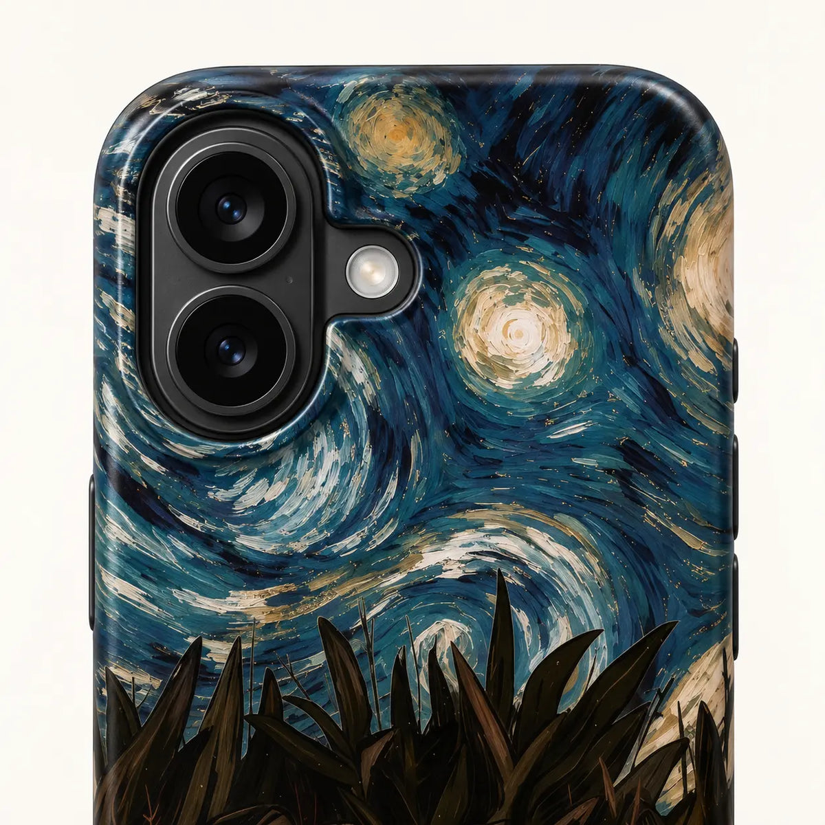 Close-up of the iPhone 16 camera protection with swirling night-sky artwork