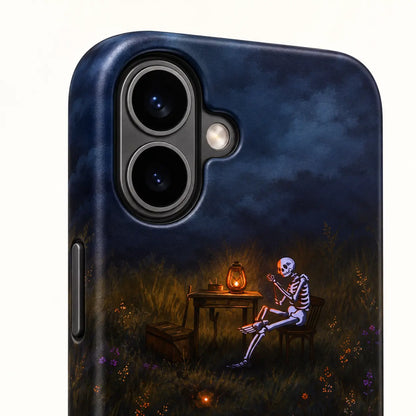 iPhone 16 dual-camera detail on skeleton lantern phone case