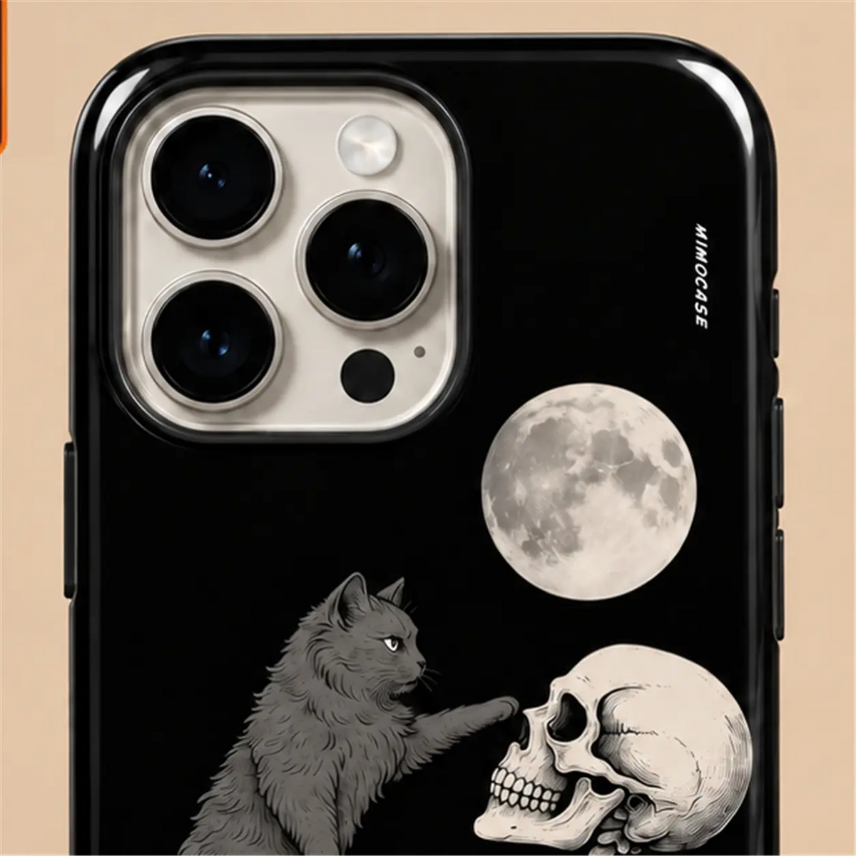 Close-up of raised iPhone camera protection on the Moonlit Cat and Skeleton case