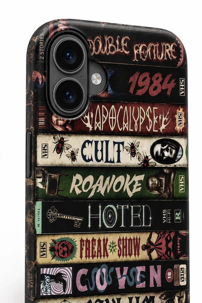 Connected iPhone dual-camera housing detail on vintage horror VHS phone case