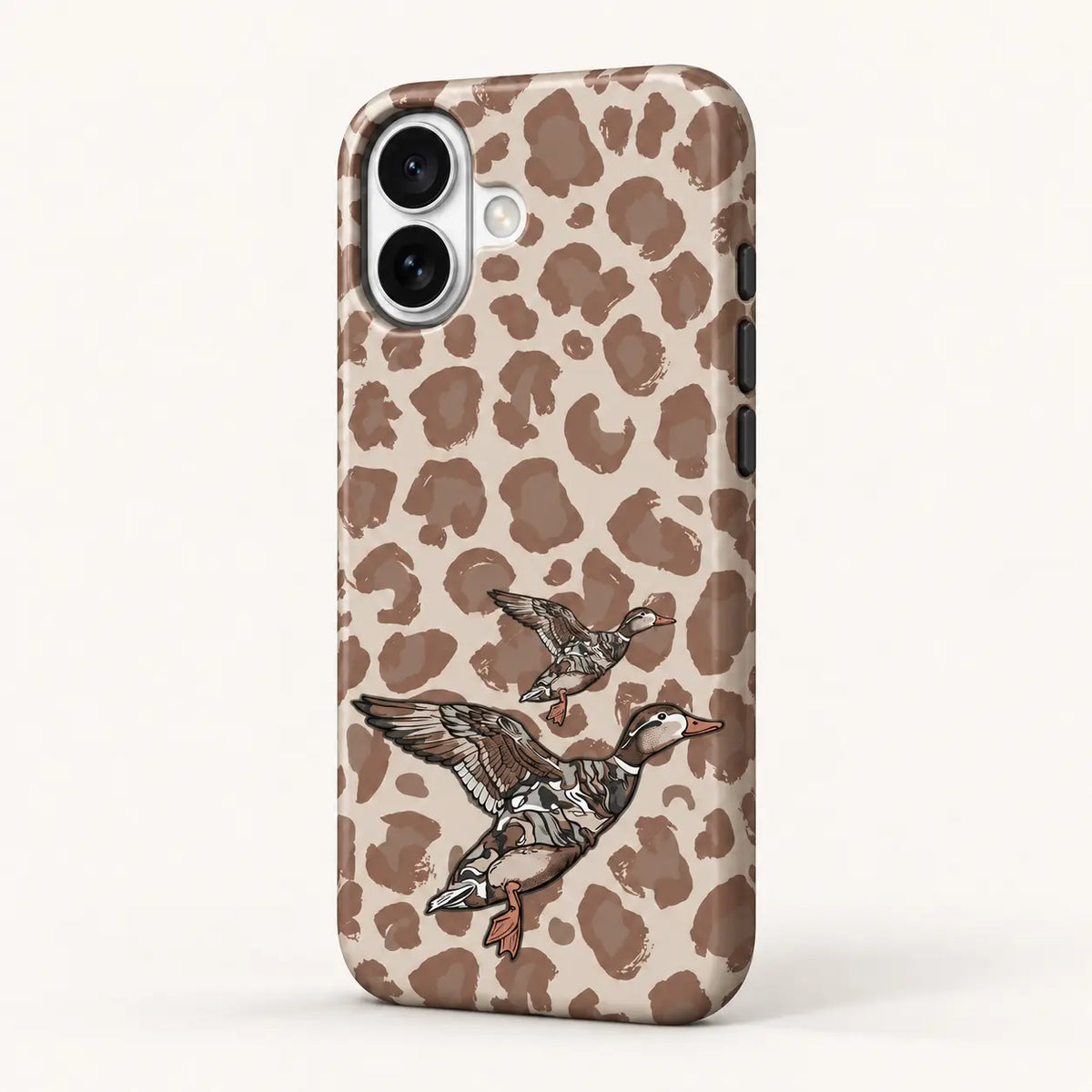 Angled iPhone side view showing continuous edge print: beige and taupe leopard spots; two flying ducks, one large and one small.
