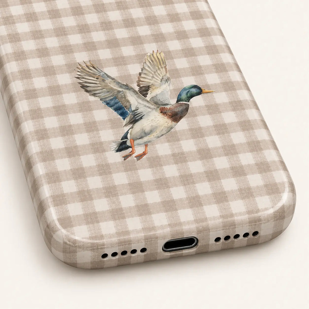 iPhone camera-corner close-up showing: taupe and cream gingham checks.