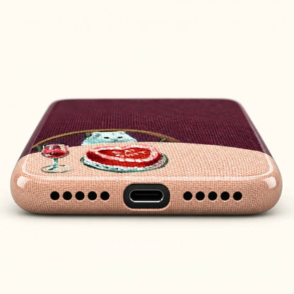 Bottom view of cat cake phone case with USB-C port and ten speaker holes