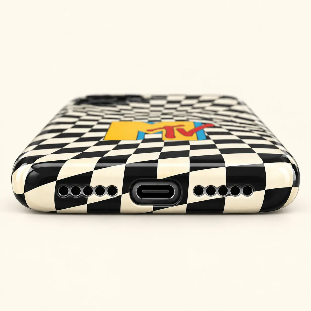 Bottom view of checkerboard phone case with USB-C port and ten speaker holes