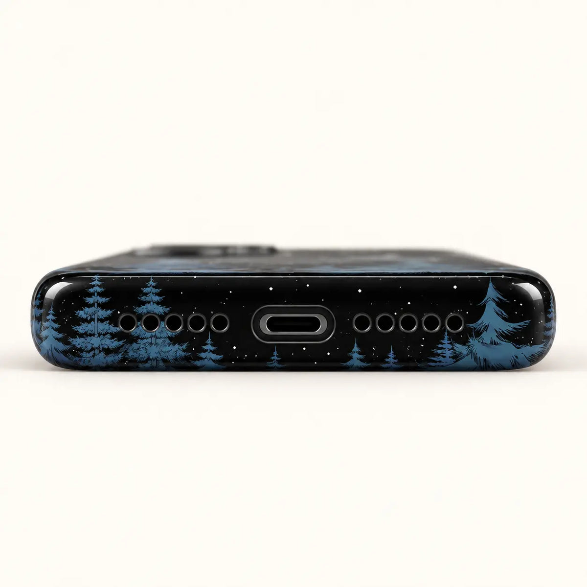 Bottom view of starry forest phone case with USB-C port and ten speaker holes