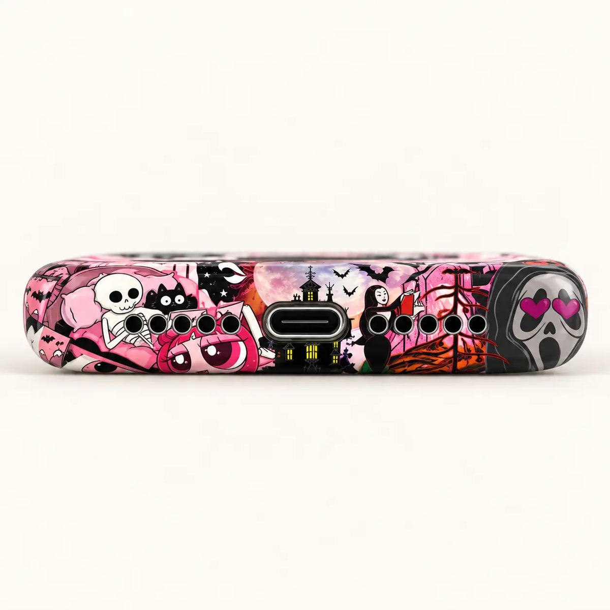 Bottom view of pink Halloween phone case with USB-C port and ten speaker holes