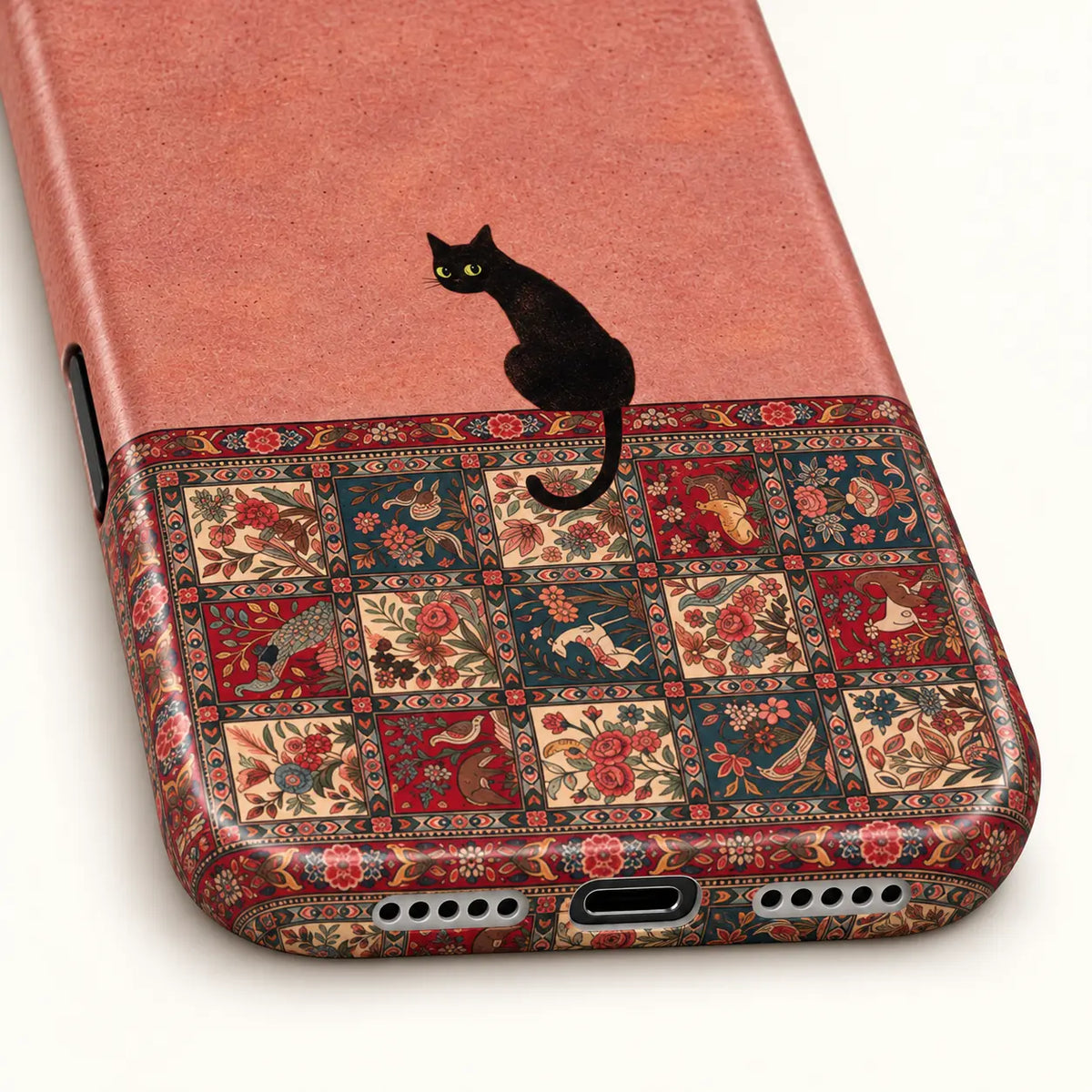iPhone bottom with charging port, speaker holes and rug print