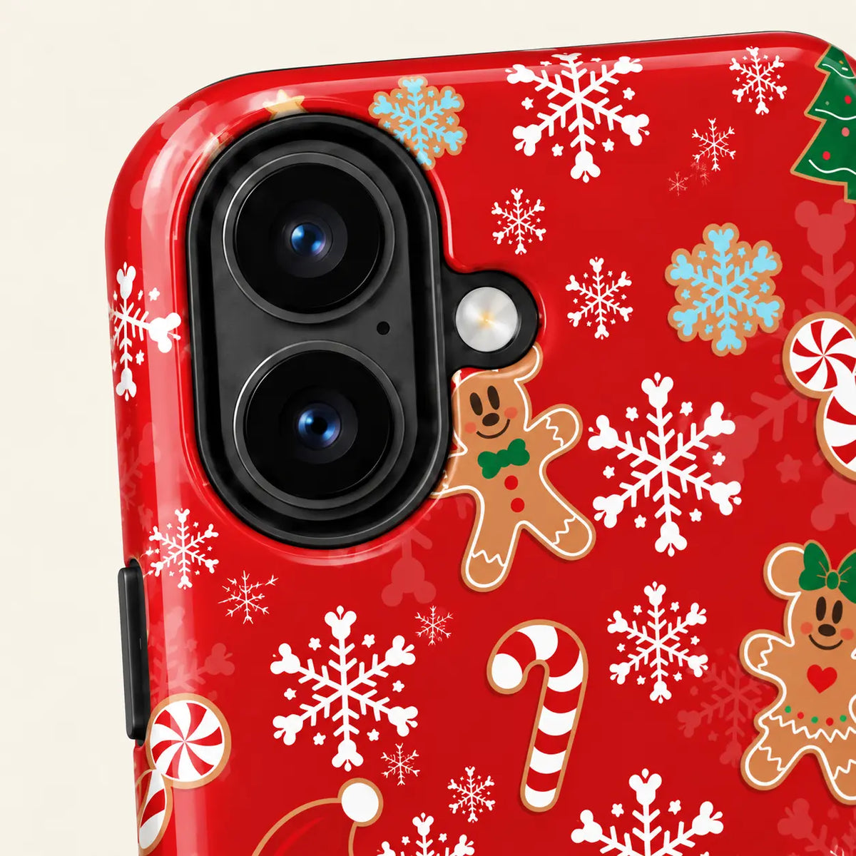 Close-up of the camera surround with red Christmas artwork and snowflake details.