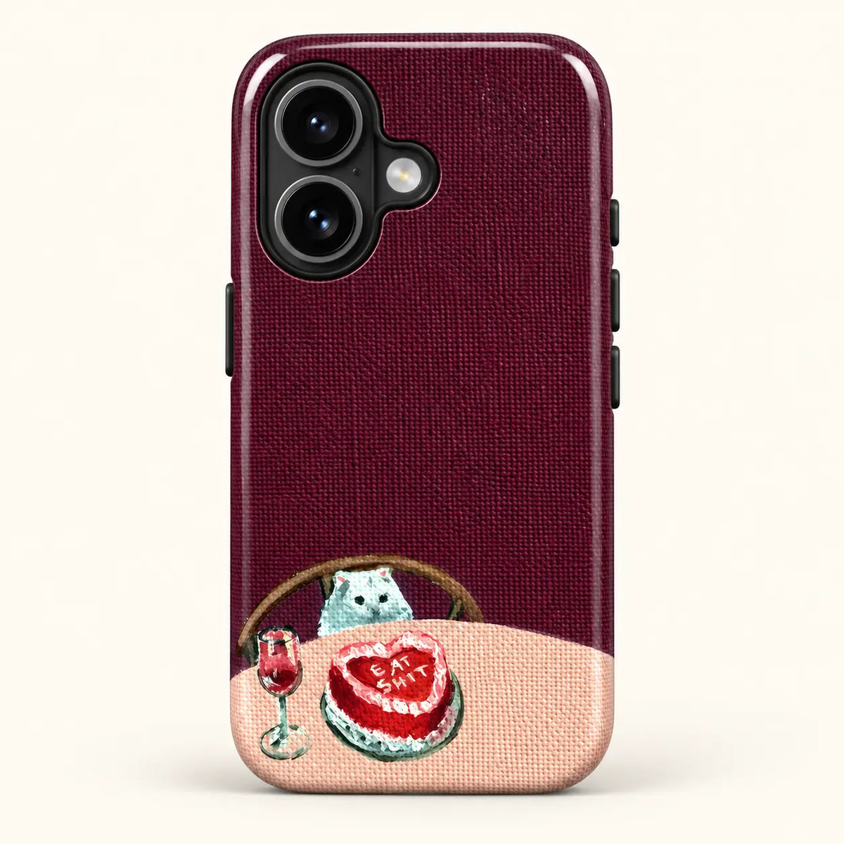 Eat Shit cat cake phone case for iPhone 16 on a warm ivory background
