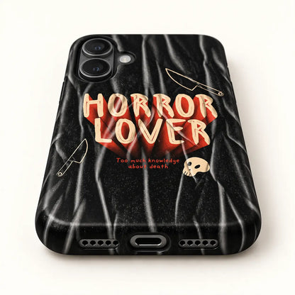 Bottom port detail of black Horror Lover iPhone case