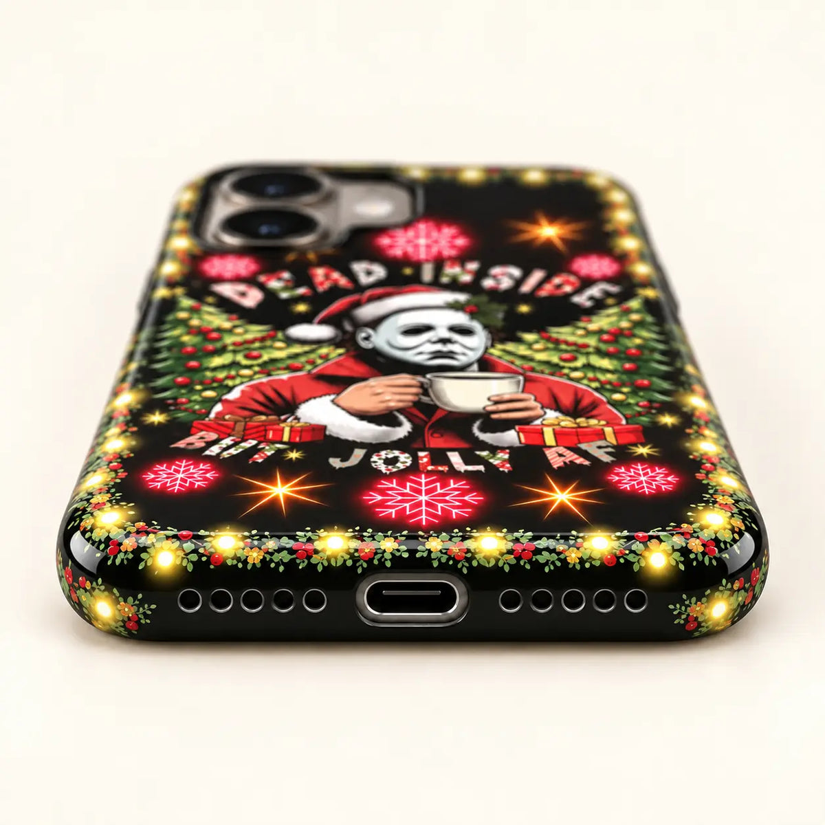 Bottom view of charging port and speaker holes on the Dead Inside But Jolly Christmas iPhone case