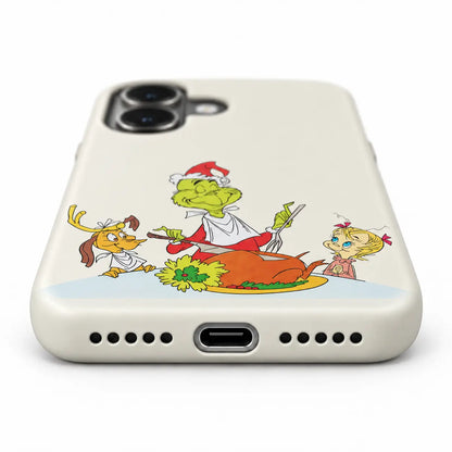 Bottom-port detail of the Christmas dinner iPhone case with centered port and speaker holes