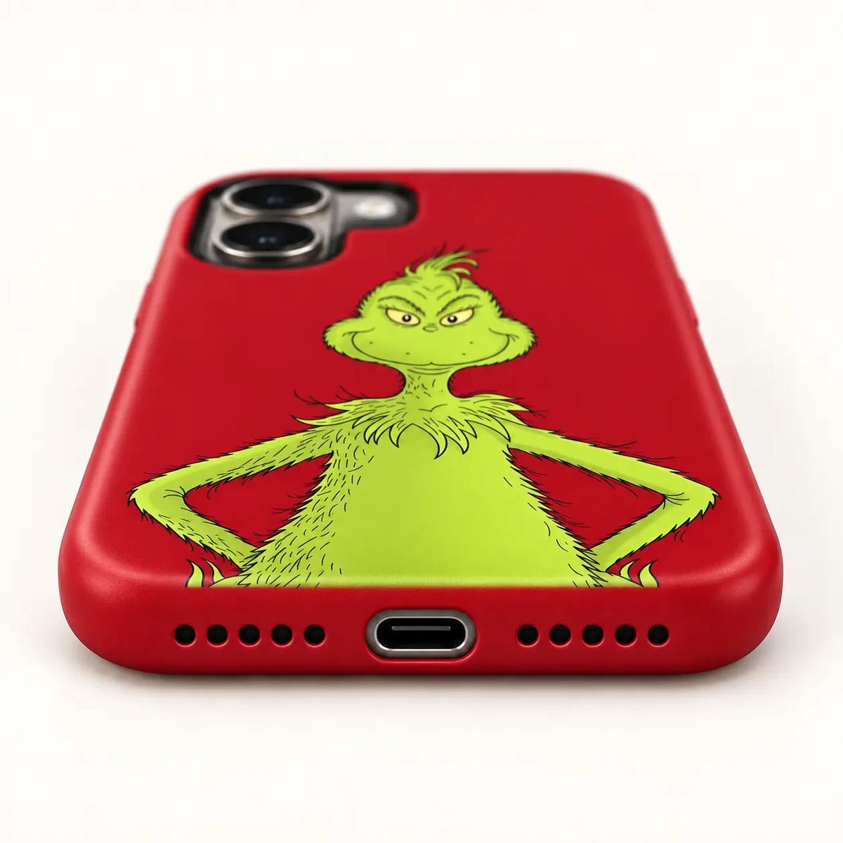 Bottom charging port and speaker holes on the Red Mean One Christmas phone case