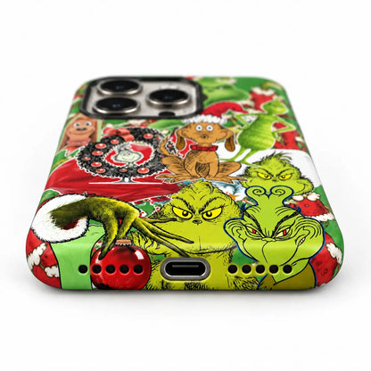 Bottom-port detail of the Christmas collage iPhone case with centered port and speaker holes