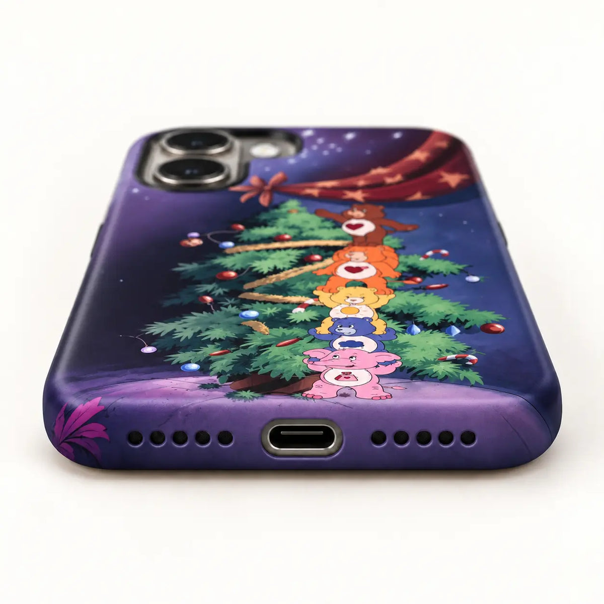 Bottom-port detail of the purple Christmas iPhone case with centered port and speaker holes