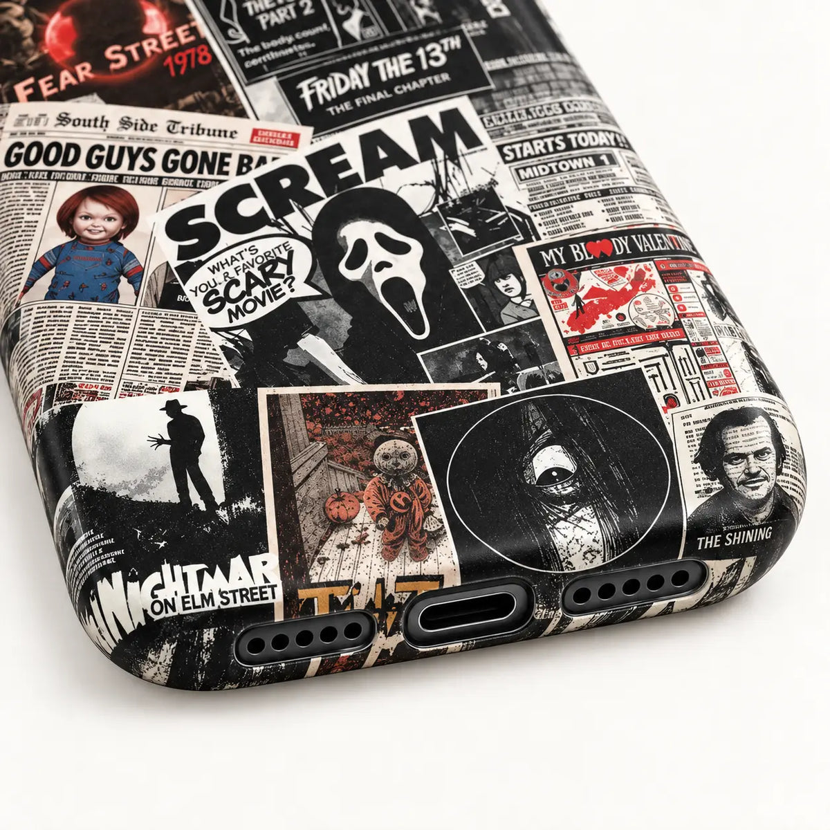 Charging port and speaker cutout detail on horror poster phone case