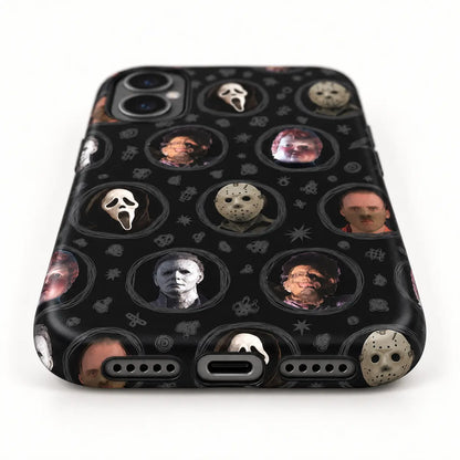Bottom speaker and charging port detail of horror movie phone case