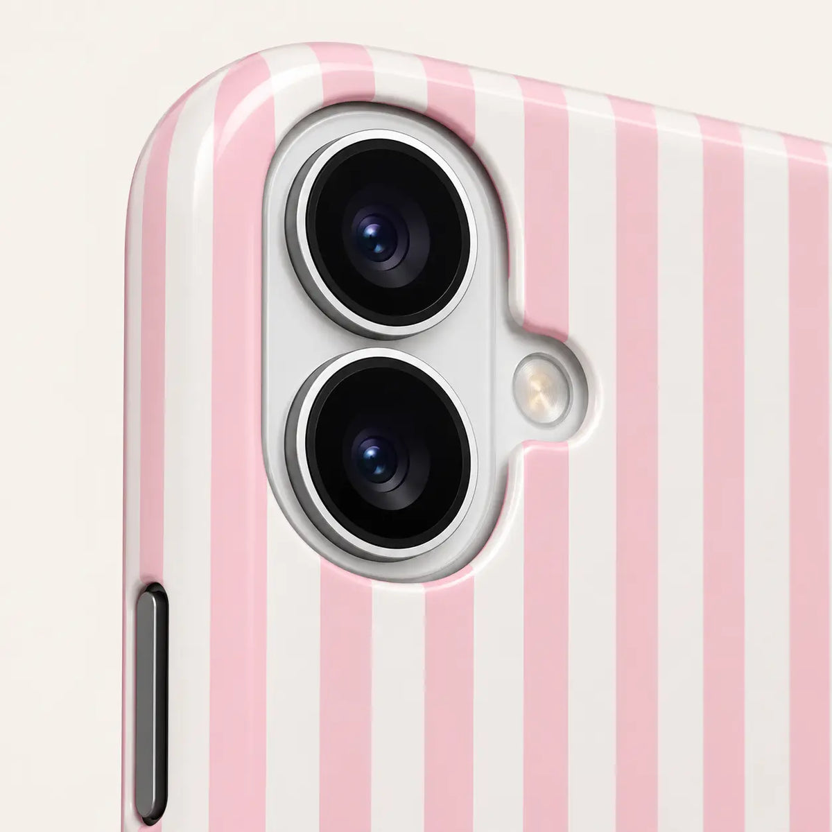 05-iphone-bottom-detail.png: iPhone bottom close-up showing charging and speaker openings: pink and white vertical stripes; one right-facing mallard with lowered wings.