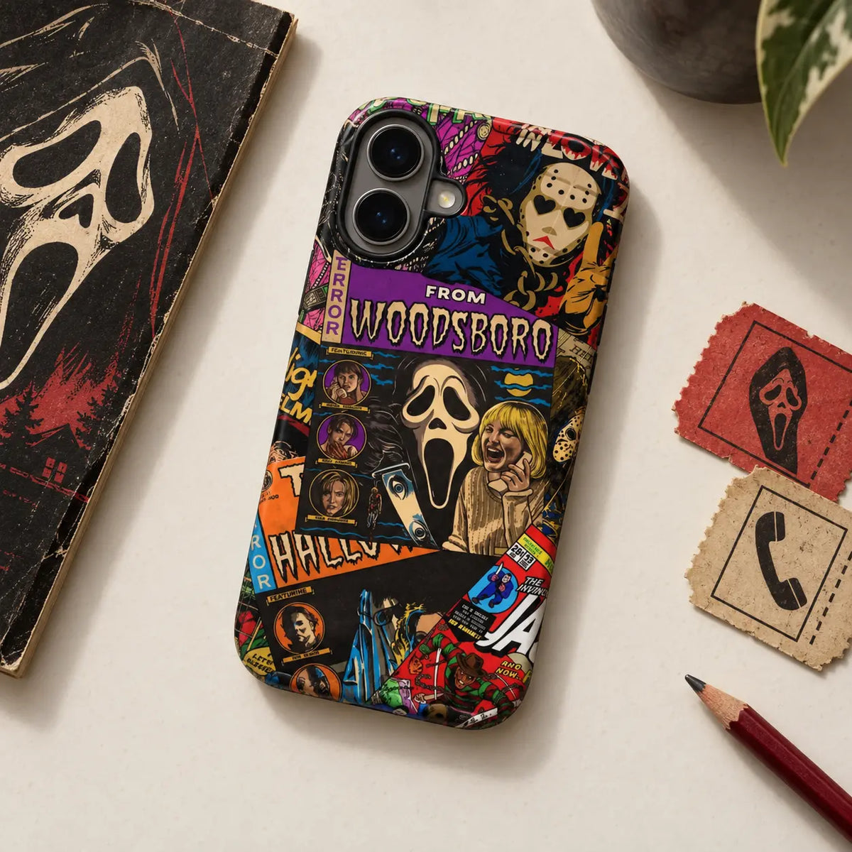 1. From Woodsboro horror comic phone case in a tabletop setting