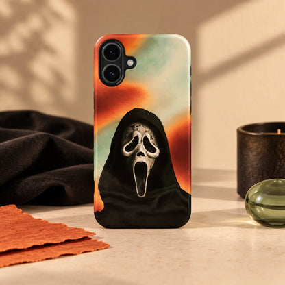 1. Smoky Scream Mask phone case displayed with coordinated dark props