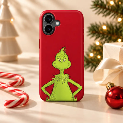 Red Mean One Christmas phone case in a warm holiday tabletop setting