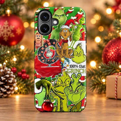 Green Christmas character collage phone case in a warm festive tabletop setting