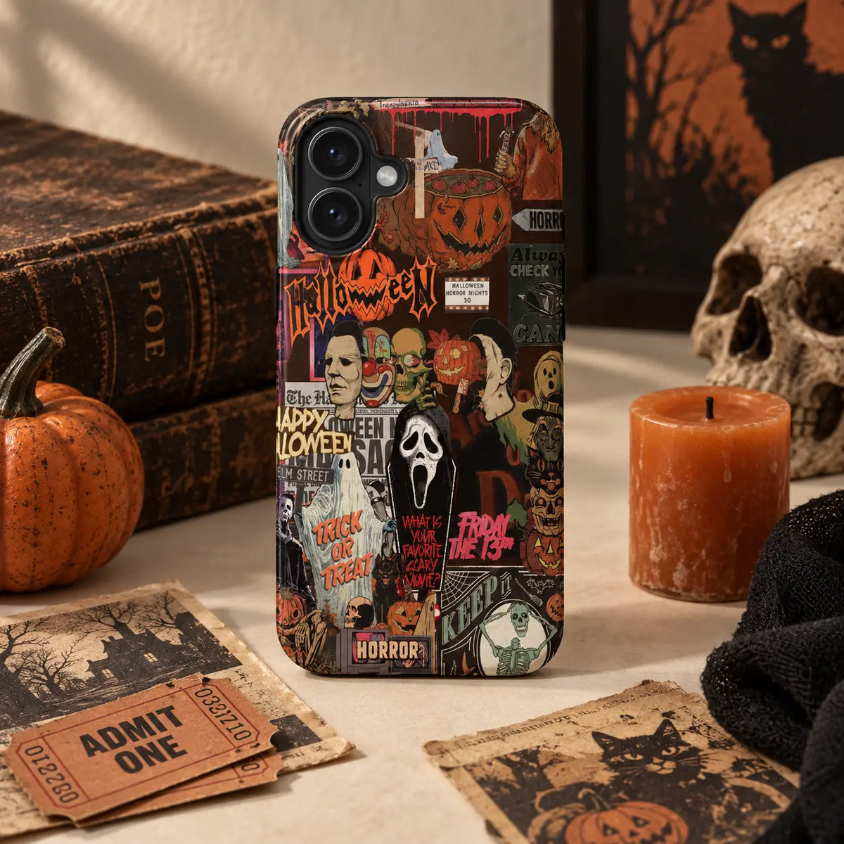Retro Horror Halloween collage phone case displayed on a vintage tabletop