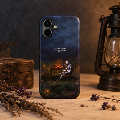 Skeleton lantern phone case displayed with vintage nighttime props