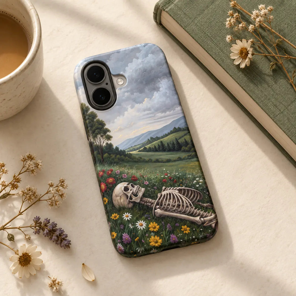 1. WAIT skeleton meadow phone case styled with flowers, a book and ceramic cup