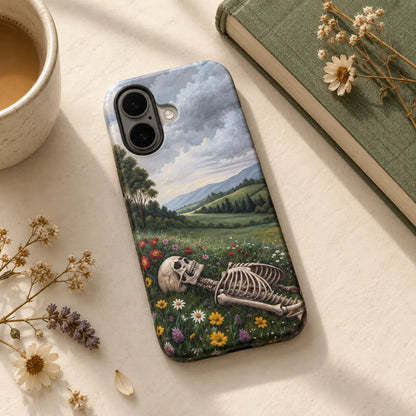 1. WAIT skeleton meadow phone case styled with flowers, a book and ceramic cup