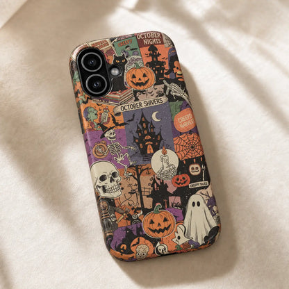 Vintage Halloween collage iPhone case resting on cream fabric in sunlight, showing pumpkins, skeletons and haunted houses