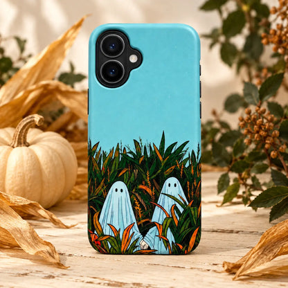 Ghosts in the cornfield phone case displayed in an autumn harvest tabletop setting